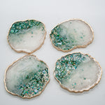 White Pearl Teal, Blue and Green Stones, Glitter and Shell Resin Coasters with Gold Edging.  Set of 4